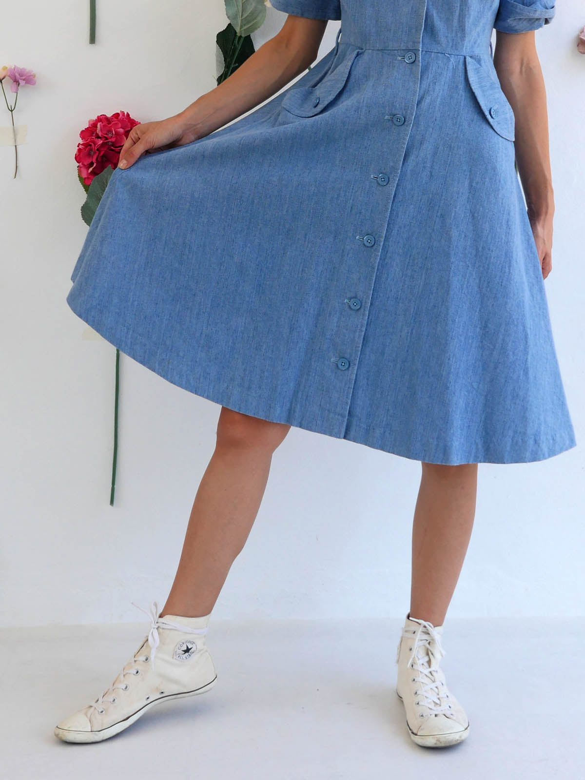 Detail of Skirt of Light Denim A-Line Dress