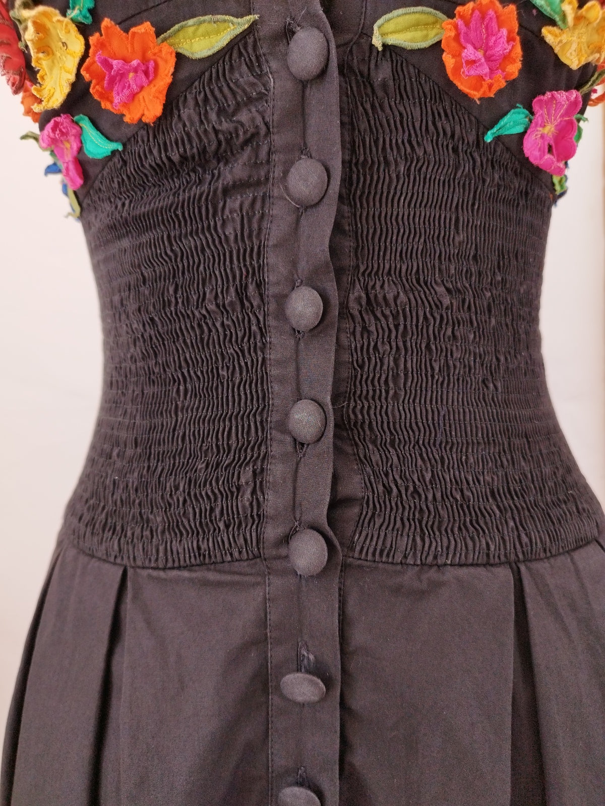 Black Mini Dress with Balloon Skirt and Colorful Flower Applique on the Bustier