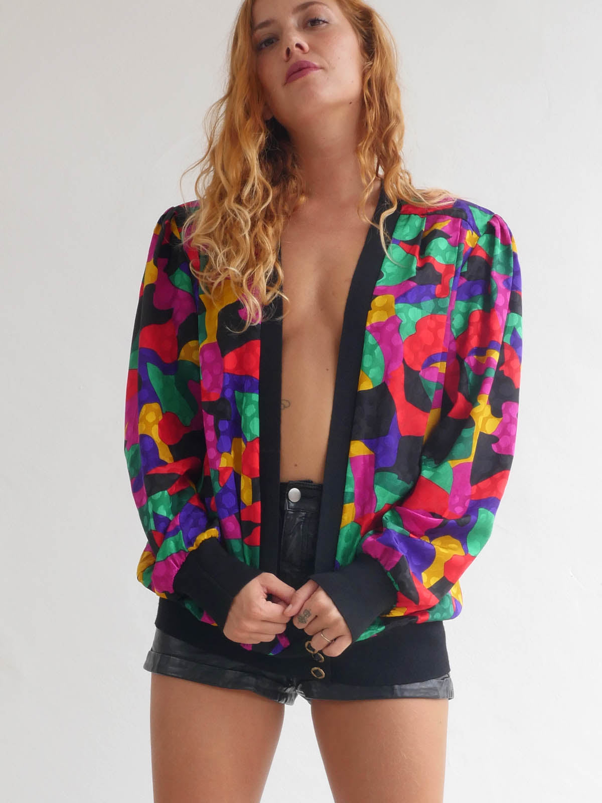 Brightly Colored Jacket with Deep Cleavage and Wide Shoulders