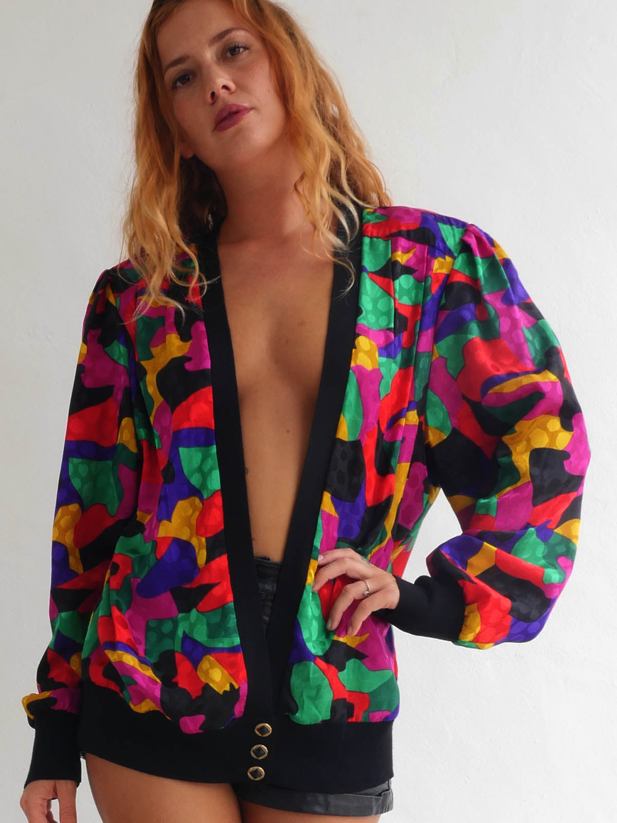 Brightly Colored Jacket with Deep Cleavage and Wide Shoulders