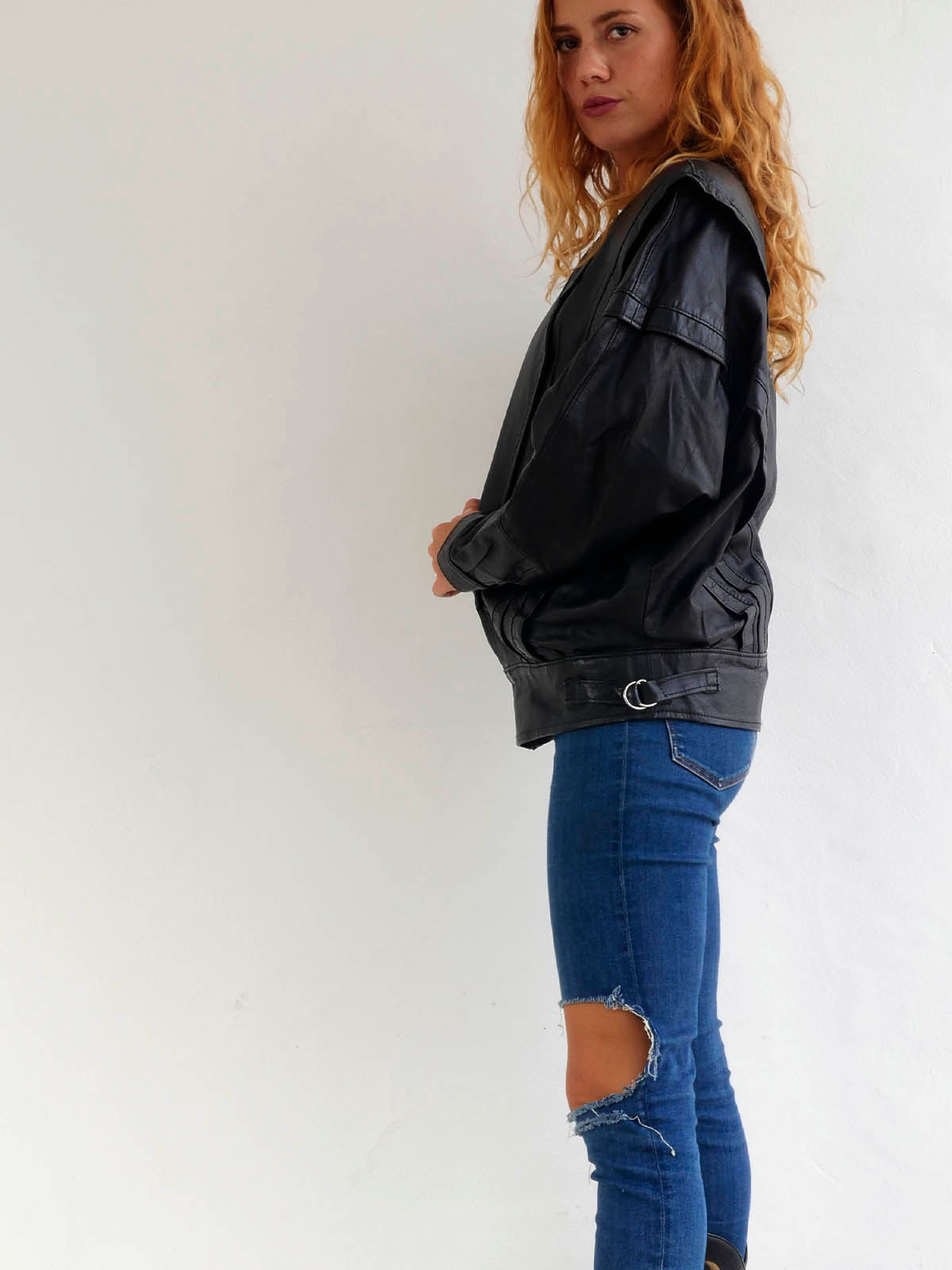 Vintage Black Leather Jacket with Large Shoulders